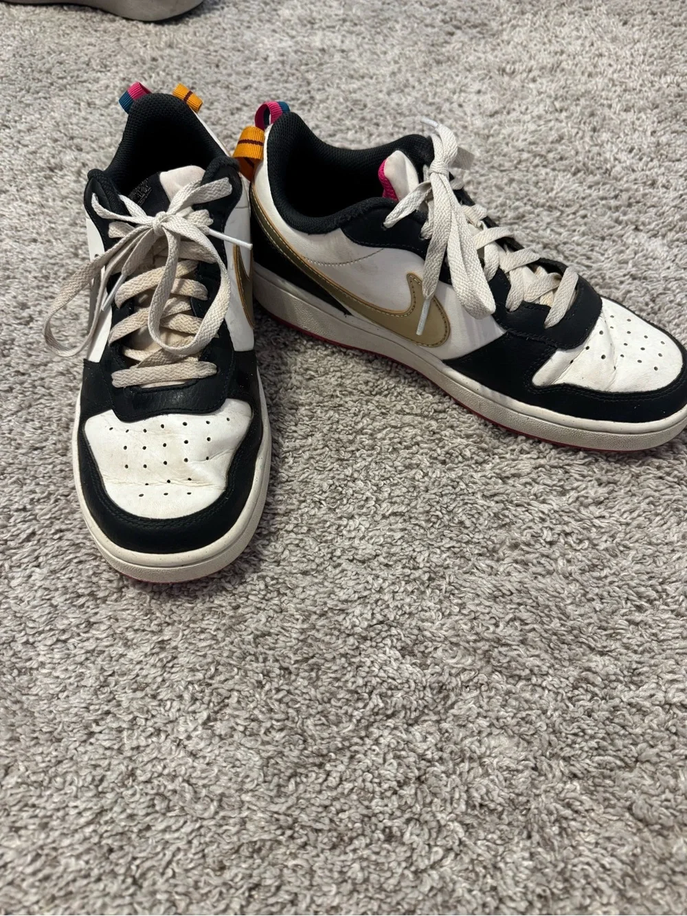 Nike Low-Top Sneakers in White, Black & Gold with Pink Accents
